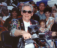 Herb rides his customized Harley-Davidson Heritage Softail motorcycle from the 1994 Chili Cookoff, a gift he received from the Pilots of Southwest Airlines.