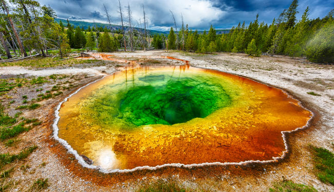 Morning glory pool from above. Stormy weather. Yellowstone National Park, Wyoming, USA