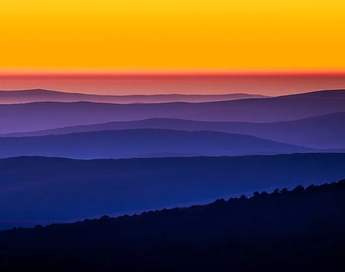 Mountains landscape with rainbow colors